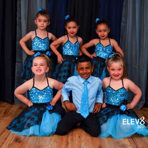 Adorable dancers in blue costumes